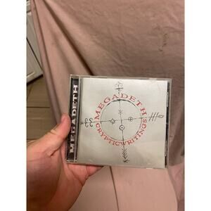 Megadeath: Cryptic Writings CD. 1997, Capitol Records. Insert w/photos & lyrics.